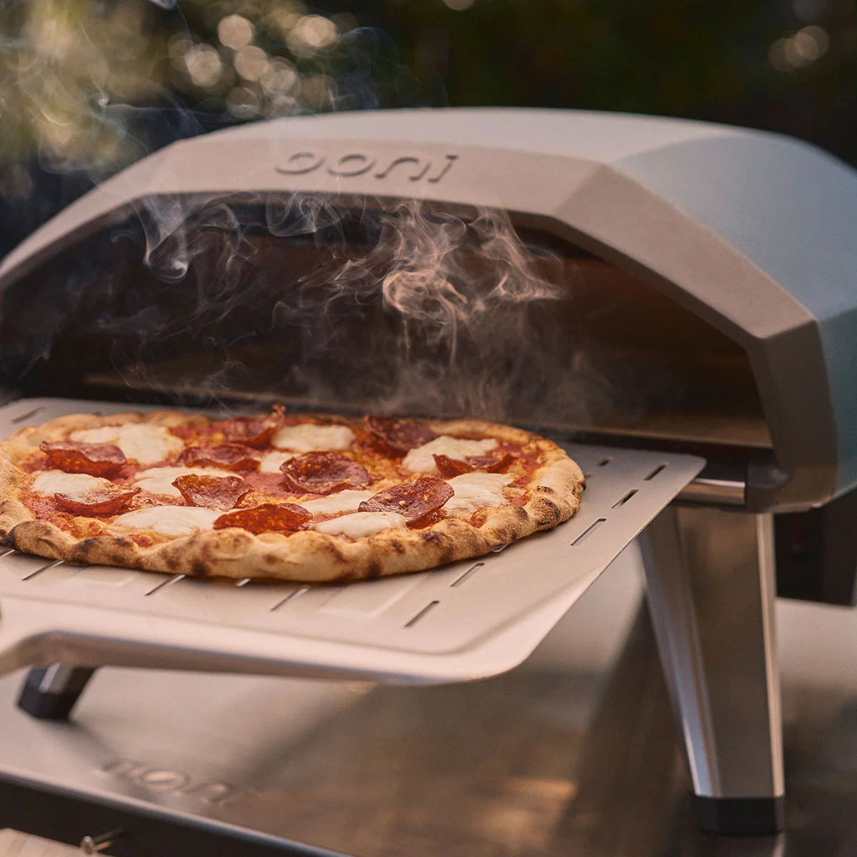 Koda 2 making a pizza for game day.