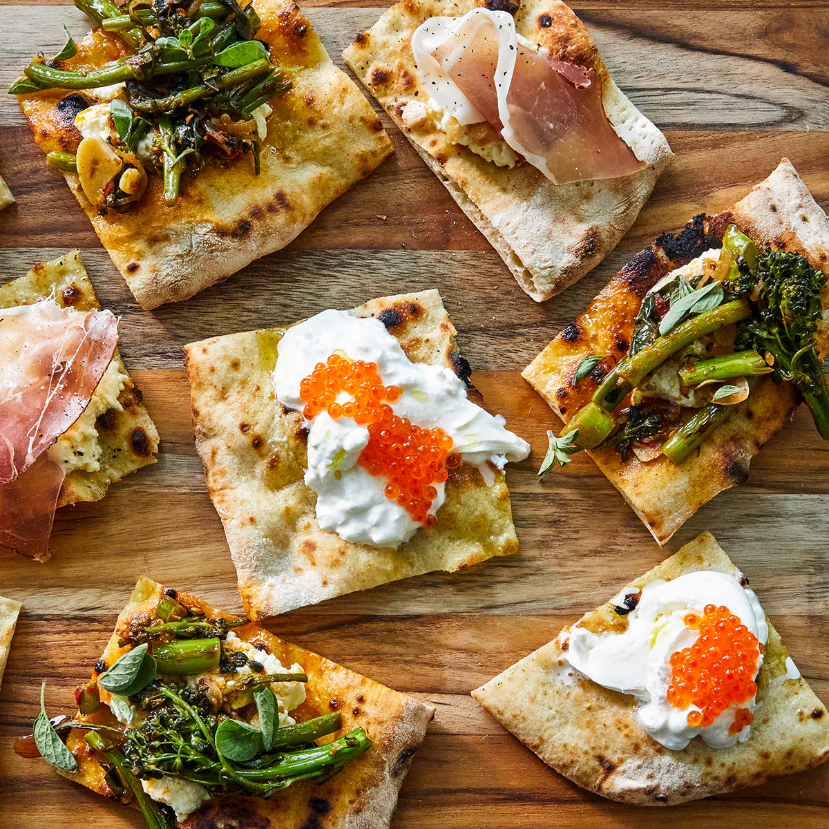 Pizza Crostini with Ricotta and Marinated Broccolini