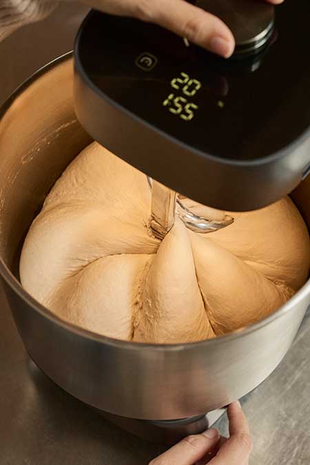Ooni Halo Pro showing dough being mixed into a pumpkin shape.