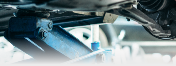 image of a vehicle on a floor jack