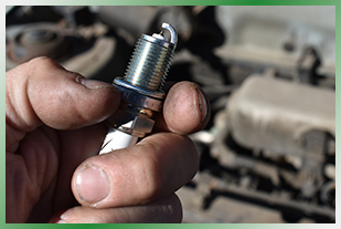 Replacing a spark plug