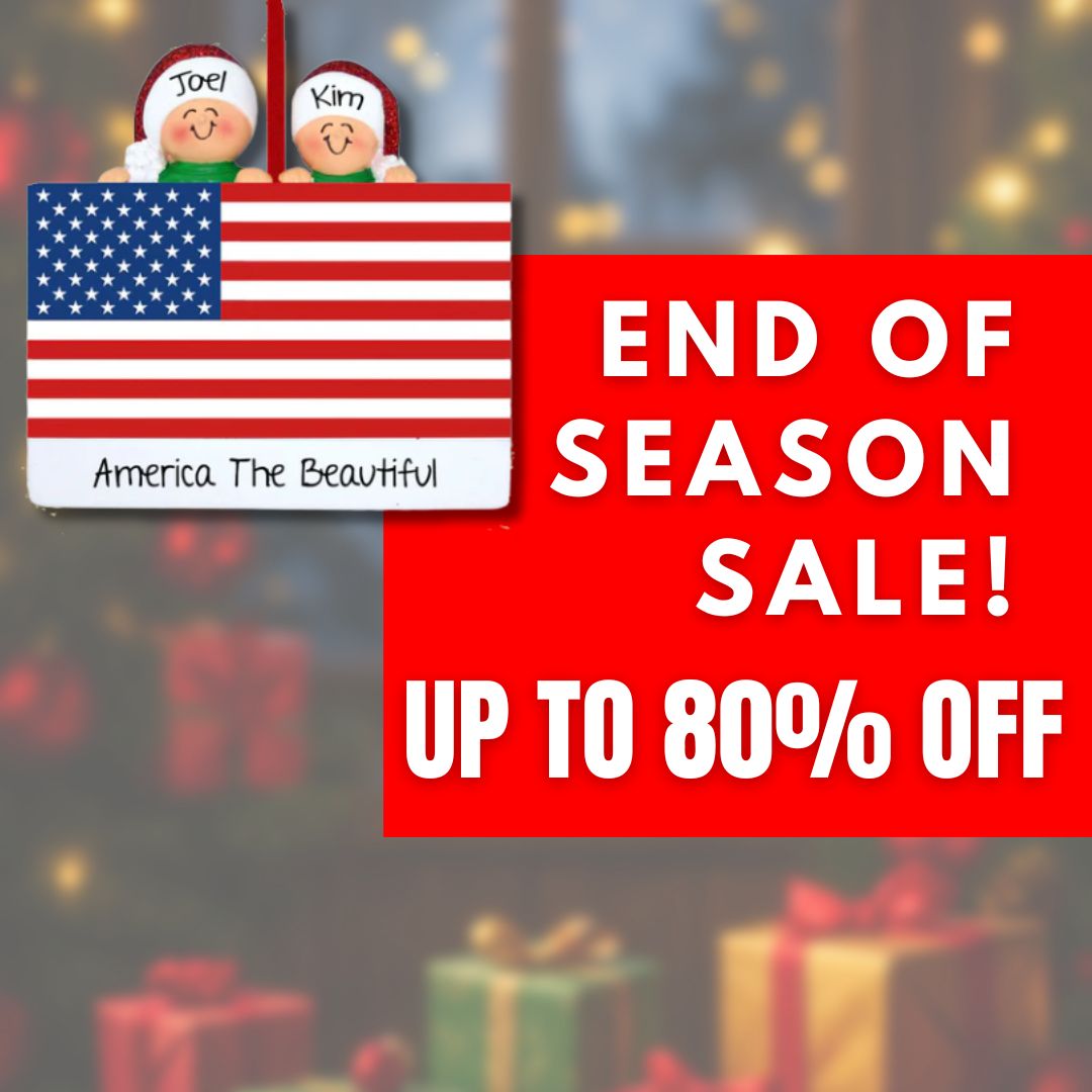 Personalized ornament featuring two smiling figures behind an American flag labeled “Joel” and “Kim” with “America the Beautiful” text. Part of OrnamentShop’s End-of-Season Clearance Event.