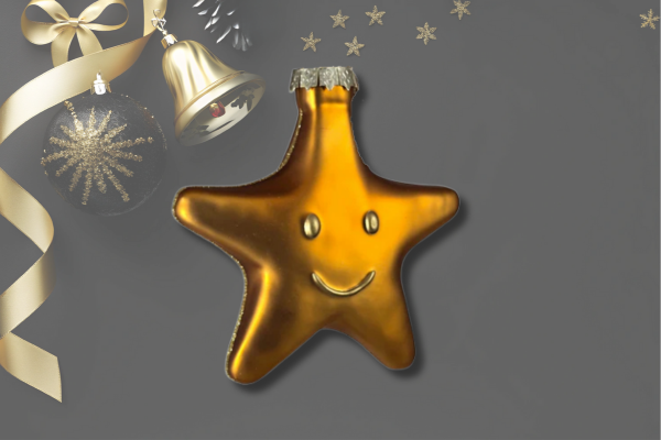Personalized gold star ornament with a smiling face and red ribbon, perfect for celebrating goals, achievements, or encouragement in the new year.