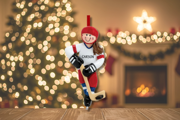 Youth hockey ornament featuring a child in full gear with personalized name and jersey number—perfect for marking the 2025 season.