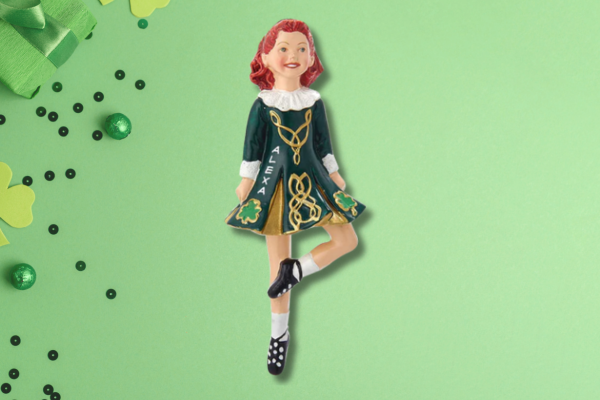 Personalized Irish dancer ornament in green dress with Celtic details and shamrock accents, perfect for St. Patrick’s Day.