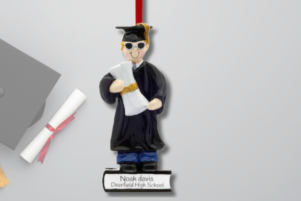 Personalized graduation ornament featuring graduate with diploma and custom name and school.