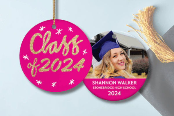 Personalized graduation ornament with bright pink “Class of 2024” design, photo insert, and custom name and school text.