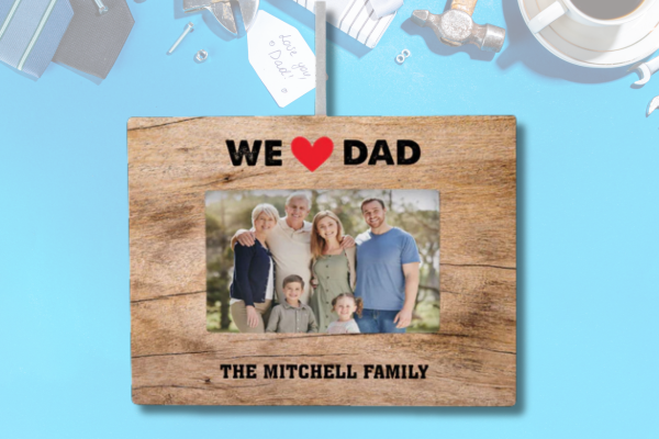 Personalized Father’s Day photo ornament featuring family picture and “We Love Dad” design.