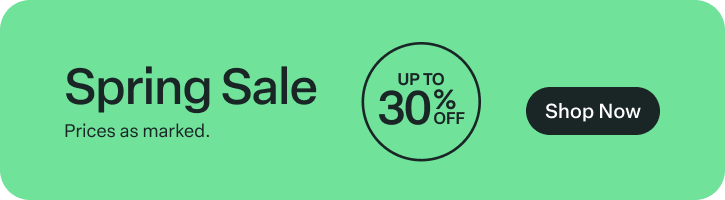an image of a green sign with a black and white sign that says spring sale