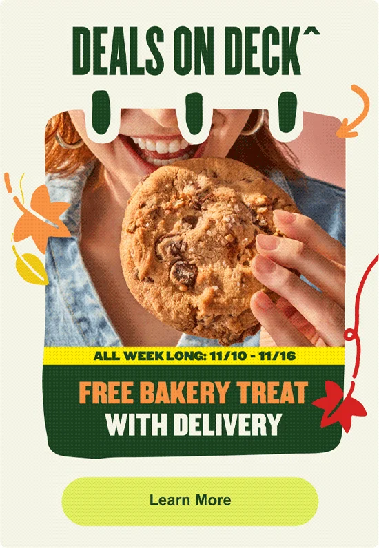 A MyPanera Days promotional banner titled DEALS ON DECK, showing a smiling person about to take a bite out of a large chocolate chip cookie. The text announces a deal running ALL WEEK LONG: 11/10 - 11/16 for a FREE BAKERY TREAT WITH DELIVERY, with a Learn More button at the bottom.