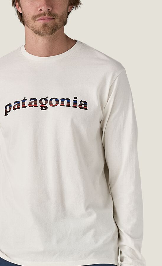 Man wearing a Men’s Long-Sleeved P-6 Logo Responsibili-Tee®