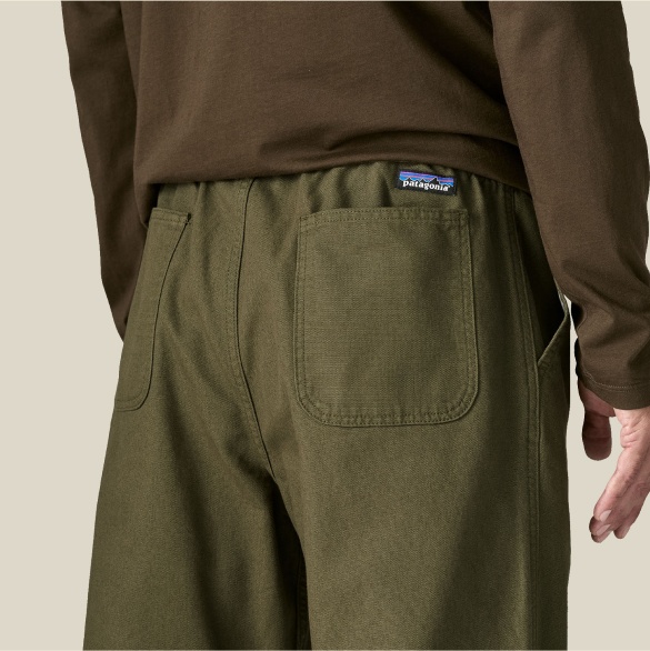 The Men’s Point Reyes Canvas Gi Pants have an elastic waistband with an adjustable belt and two drop-in patch pockets in back.