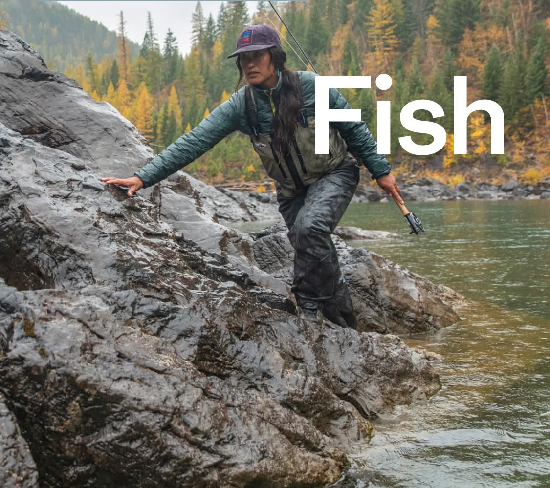 The word fish over a photo of a person holding a fishing pole and climbing across a rock.