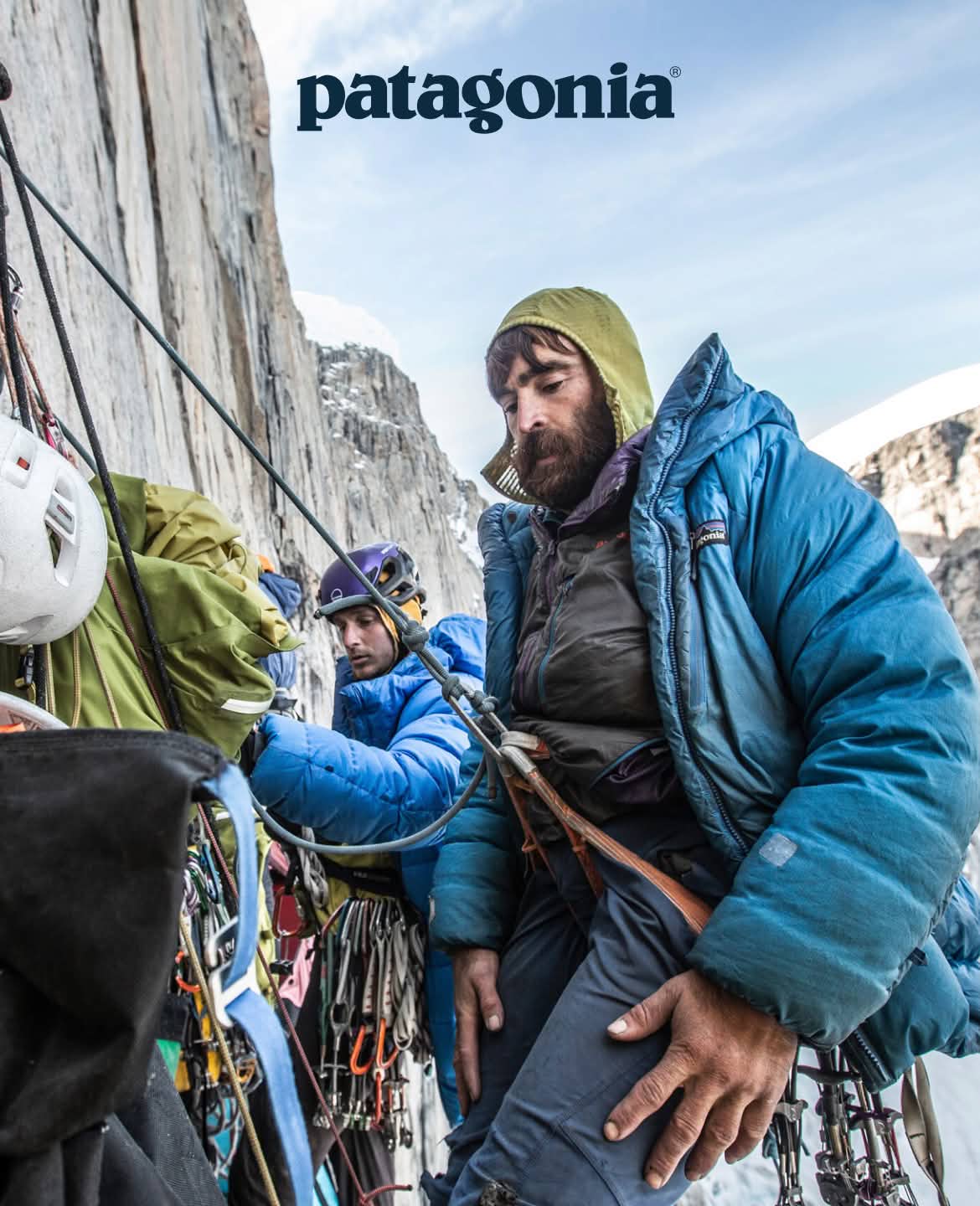 Patagonia. Two climbers hang from a rock wall.