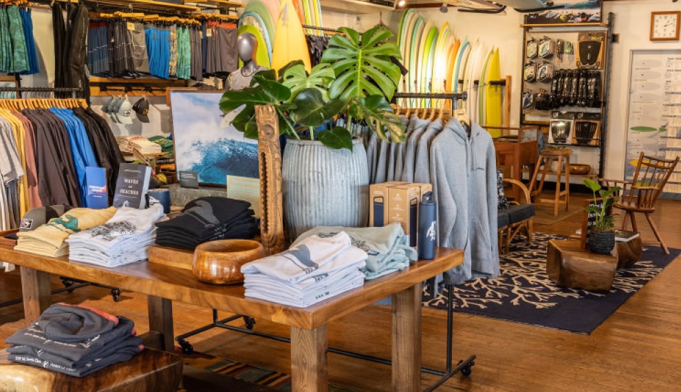 Clothing on racks inside a Patagonia store.