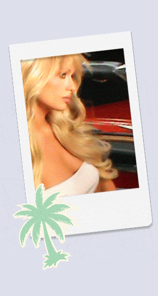 image of Paris Hilton in red convertible