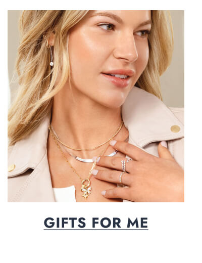 A woman poses, showcasing Gold Necklaces and Diamond Rings. Click here to View Gifts For Me