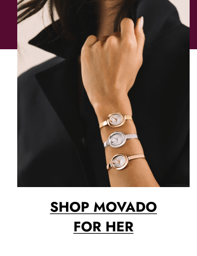 Woman wearing stacked Movado watches with minimalist round dials. Click shop Movado for her.