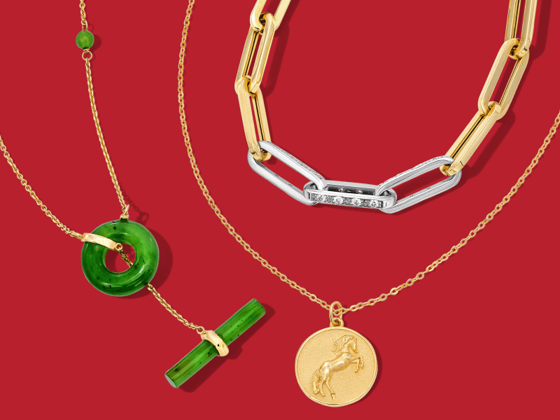 Red banner with gold jewelry, jade charms.
