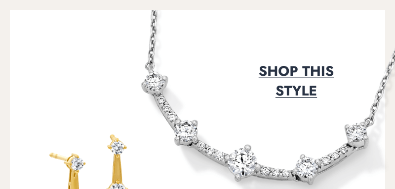 Curved silver diamond necklace with graduated round stones. Click to shop this style.