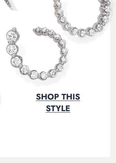 Small silver diamond hoop earrings. Click to shop this style.