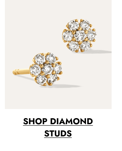 Yellow gold diamond stud earrings in a floral cluster design. Click to shop diamond studs.