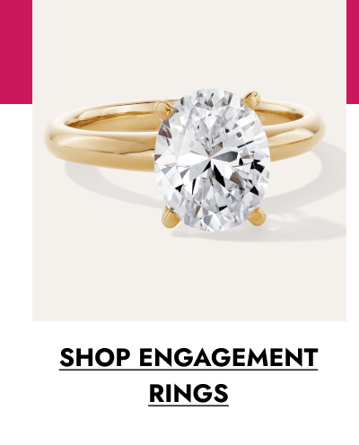 Yellow gold engagement ring with oval-cut diamond. Click to shop engagement rings.