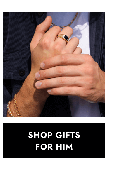 Man wearing yellow gold chain necklace, layered yellow gold bracelets, and yellow gold signet ring. Click shop gifts for him.