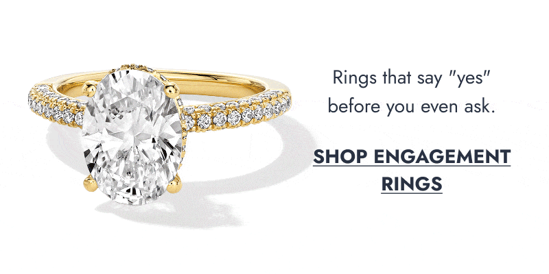 yellow gold oval-cut engagement ring. click shop engagement rings.