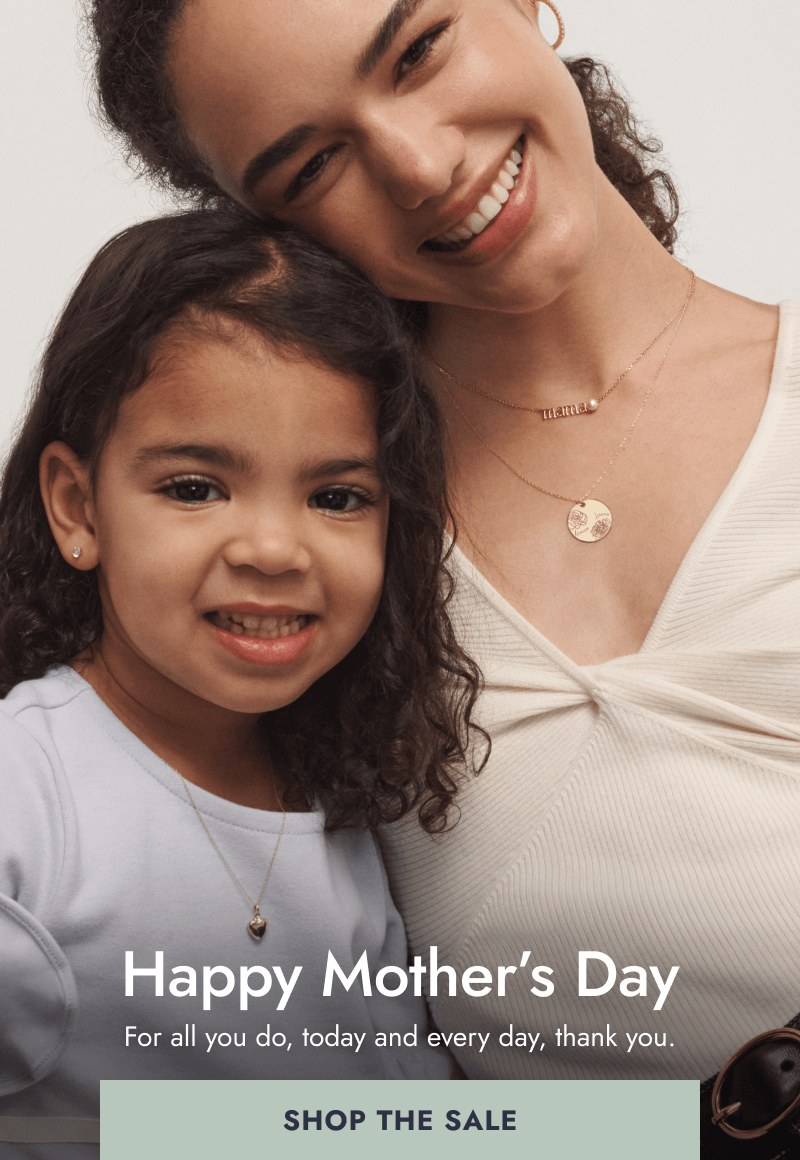 Smiling mom in variety of fine jewellery with her young daughter. Happy Mother’s Day. Shop the sale.