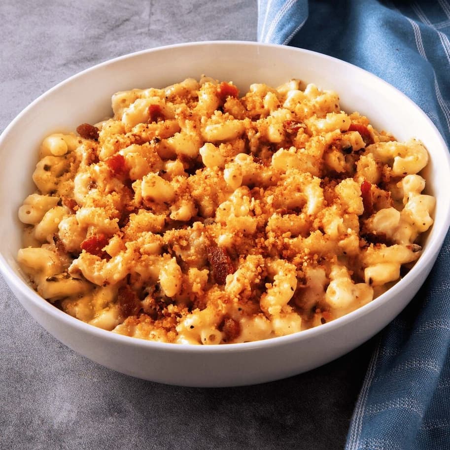 an image of a tray of white cheddar mac and cheese