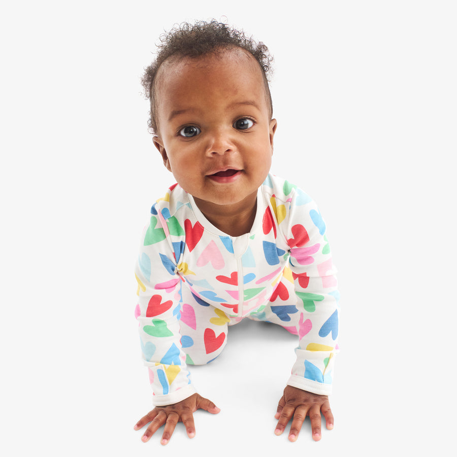 Baby organic zip footie in rainbow candy hearts