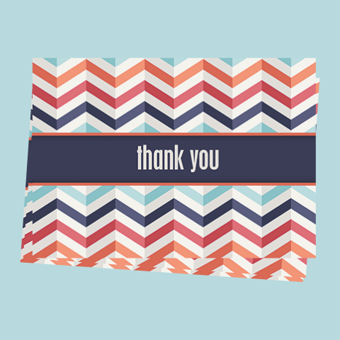 A stack of Thank You greeting cards.