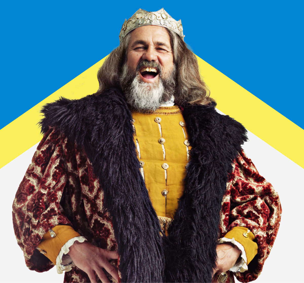 A jovial kind standing proudly and laughing.