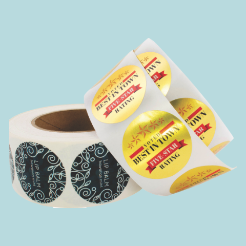 Two rolls of circular stickers.