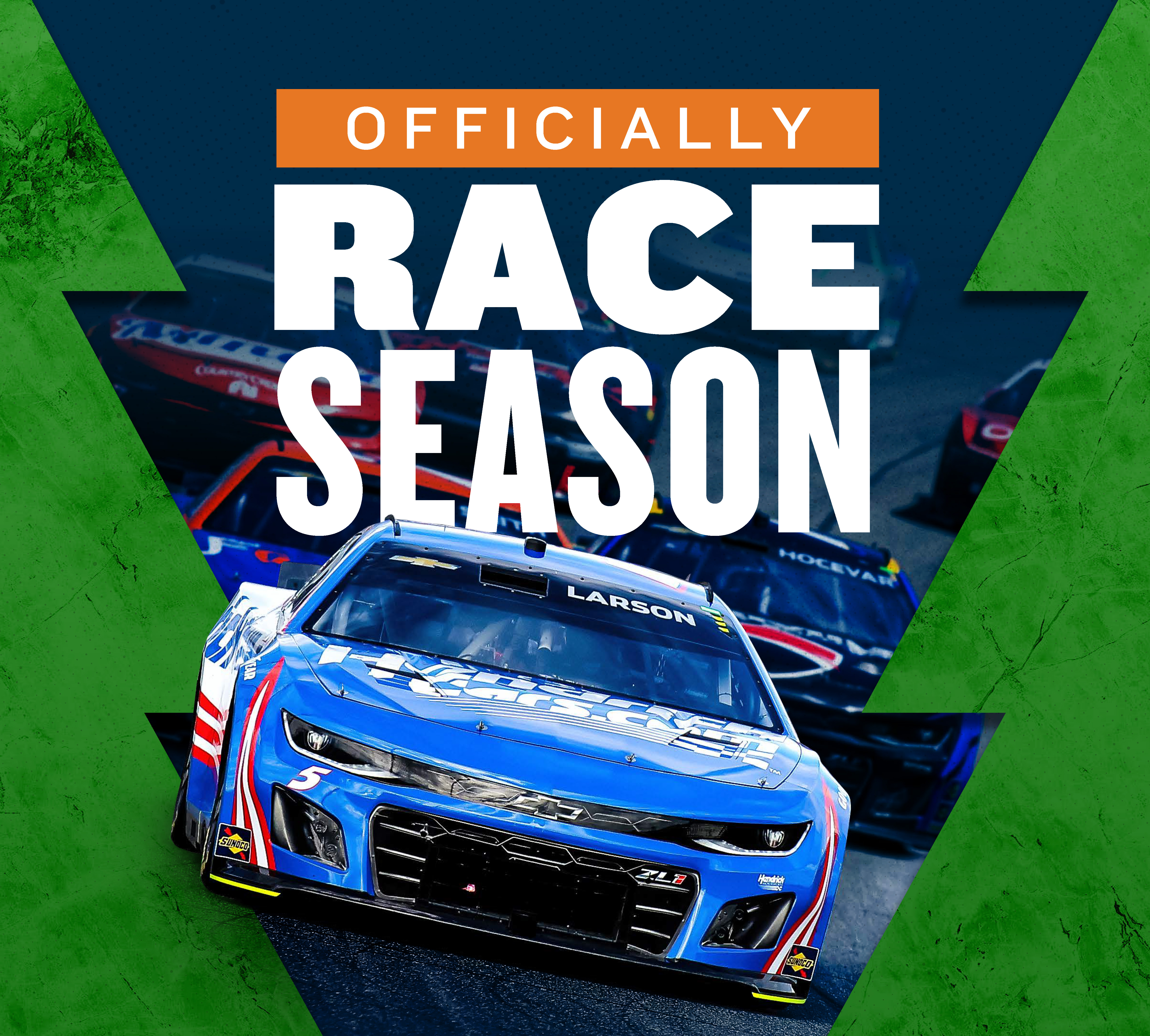 It's officially race season. Picture of Kyle Larson racing towards the viewer. 