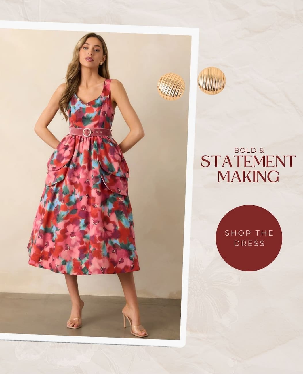 Image of model wearing a Pink Multi Floral Print Cotton Belted Midi Dress. Button: 'Shop the Dress.'