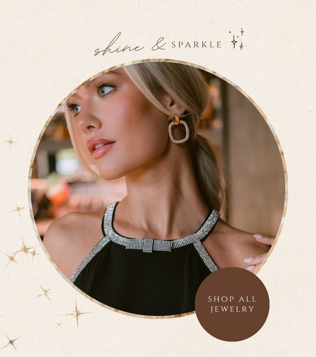 'Shine & sparkle.' Image of model wearing Gold Rhinestone Statement Drop Earrings. Button: 'Shop All Jewelry.'