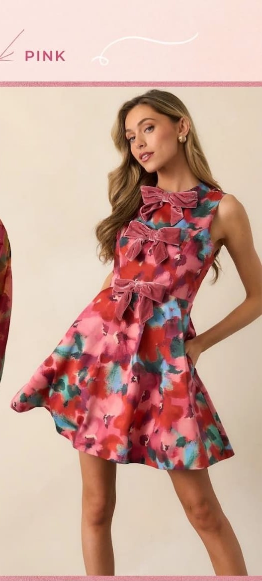 Image of model wearing a Pink Multi Floral Cotton Bow Mini Dress.