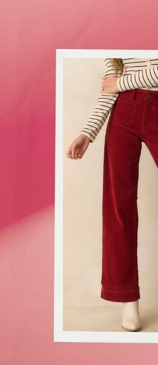 Image of model wearing red corduroy pants.