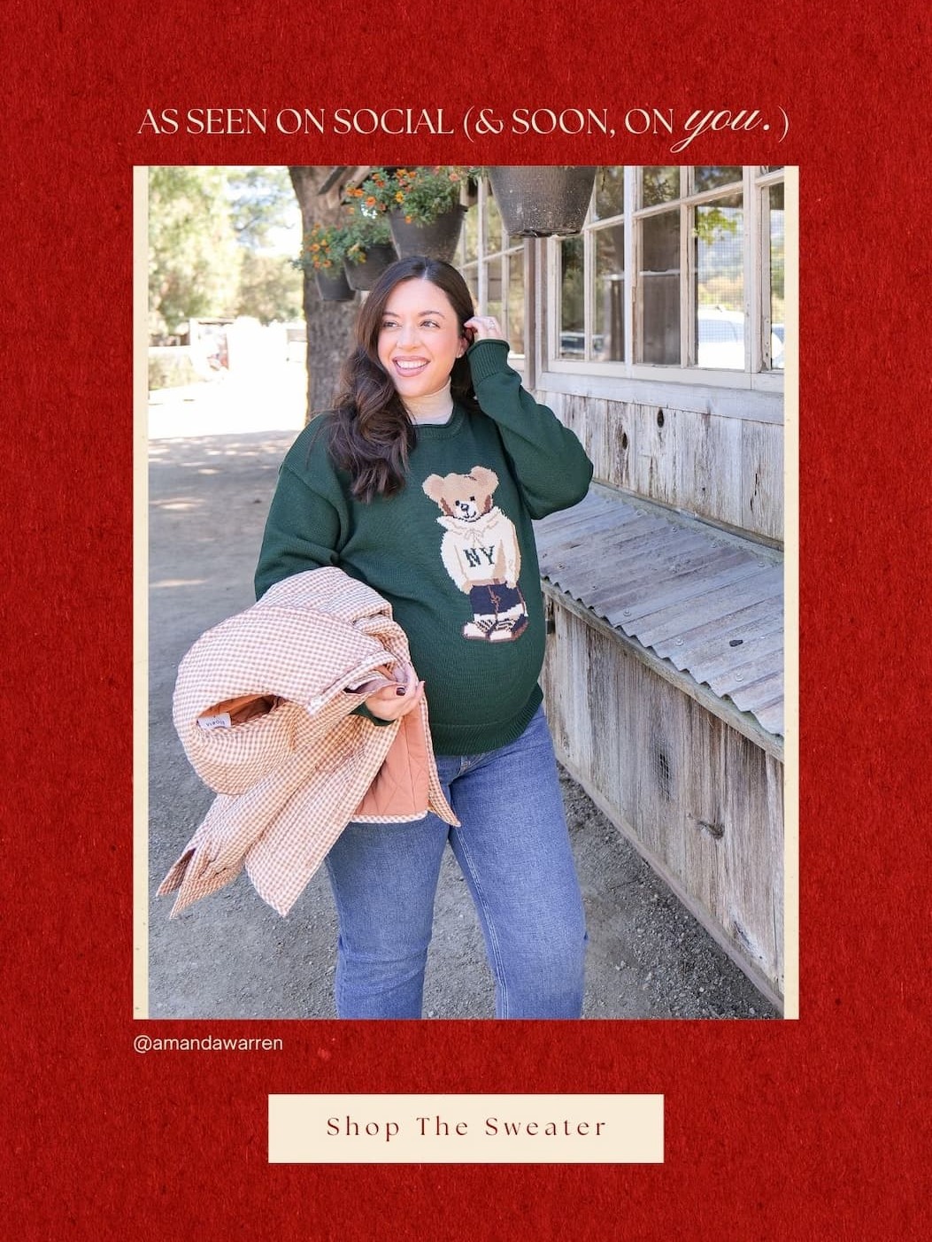 'As seen on social.' Image of model wearing a Hunter Green Teddy Bear Graphic Crewneck Sweater. Button: 'Shop The Sweater.'