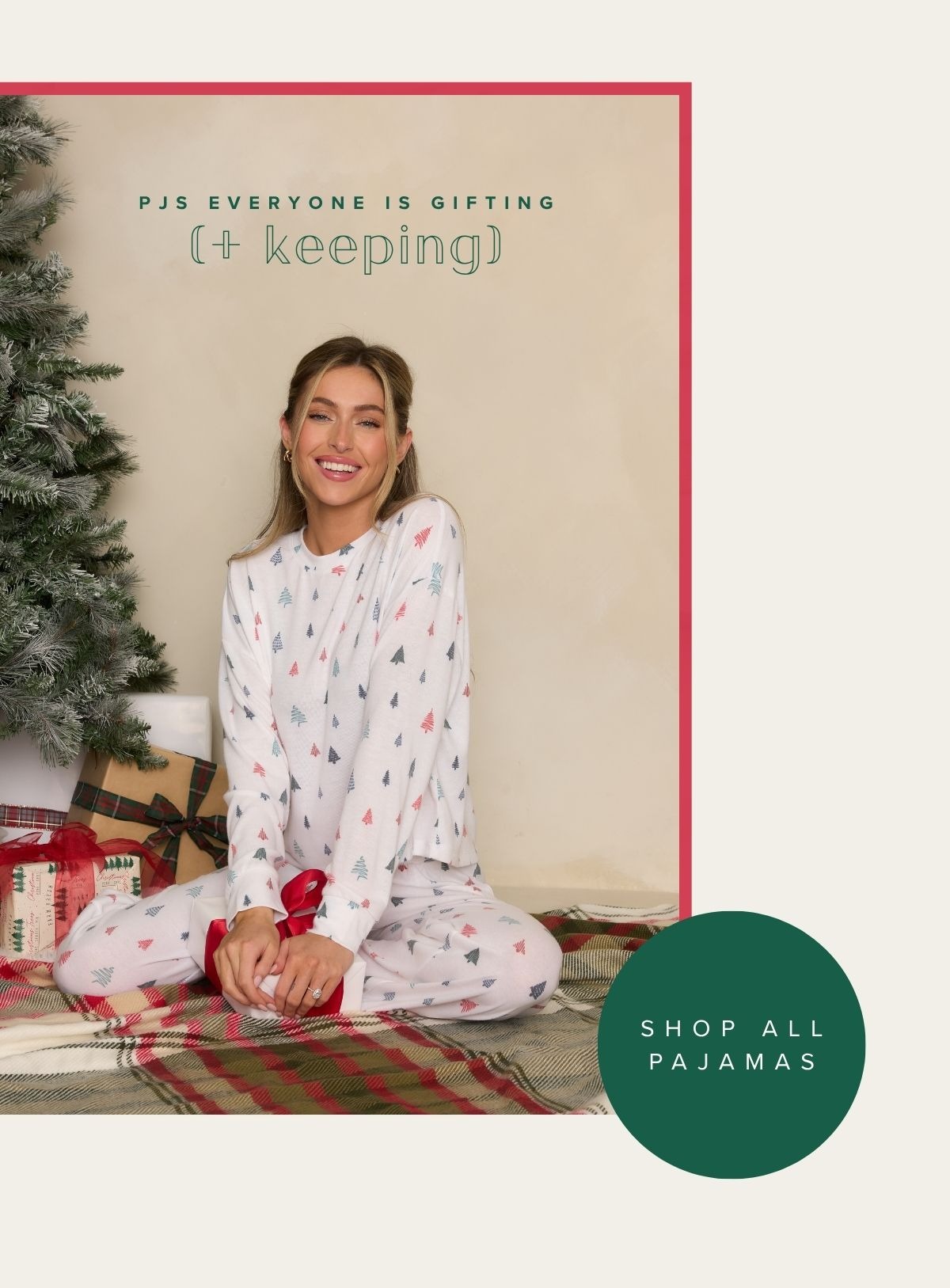 'PJs everyone is gifting and keeping.' Image of model wearing Christmas tree PJs. Button: 'Shop All Pajamas.'