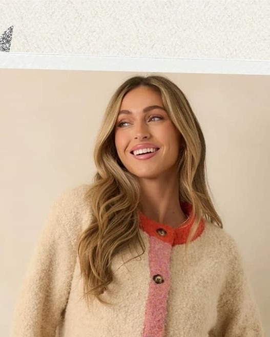 Image of model wearing a Ivory Multi Knit Color Block Cardigan.