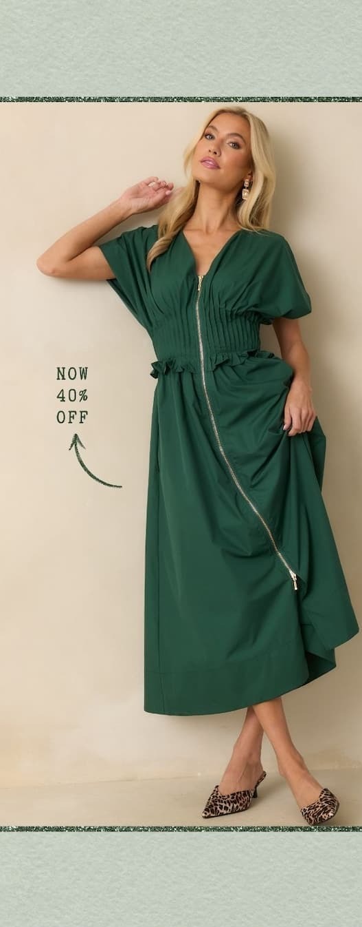 Image of model wearing a  Green Smocked Waist Zip Maxi Dress.