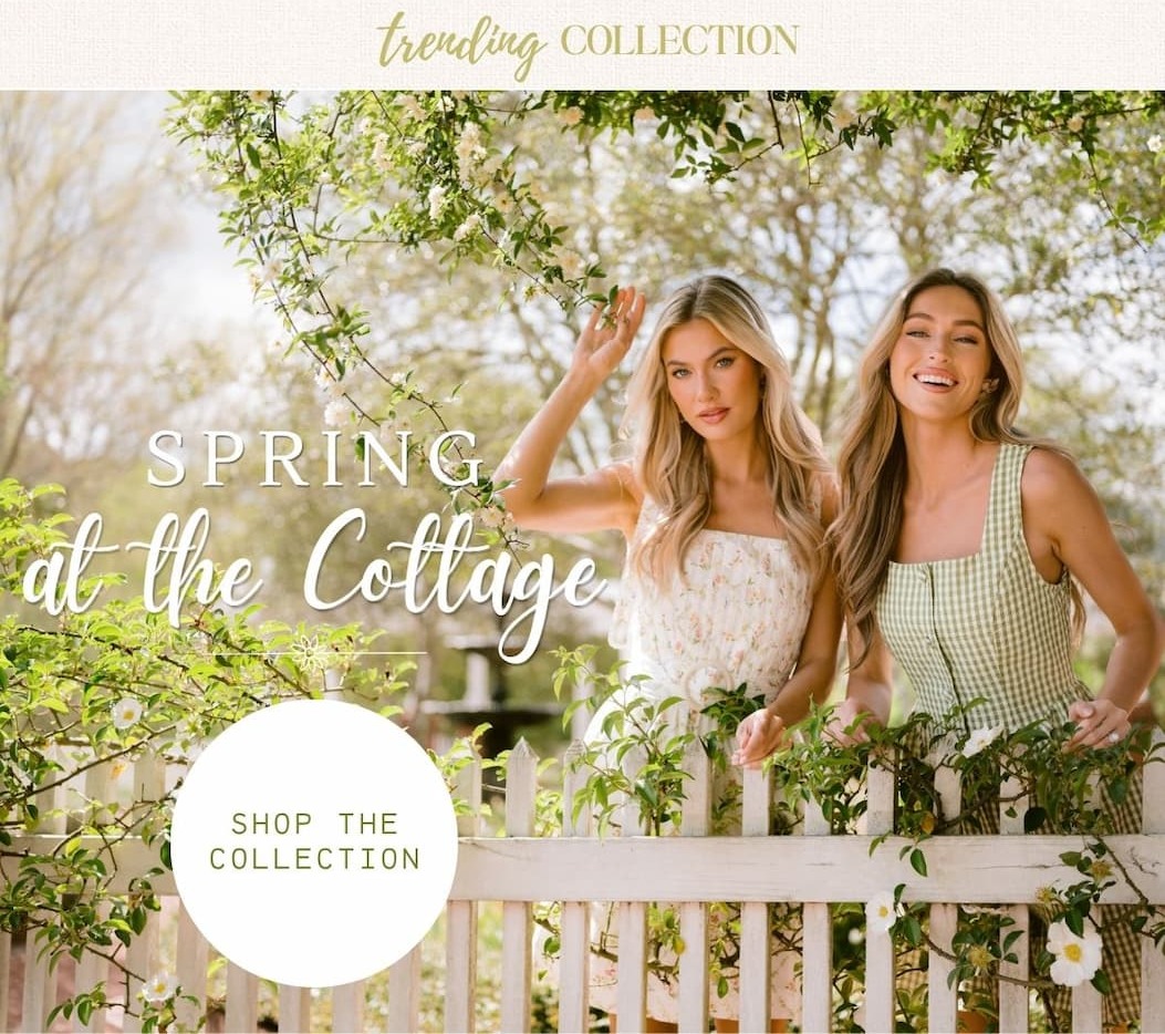 'Trending Collection. Spring at the Cottage. Shop the Collection.' Models pictured in a garden wearing spring mini dresses.