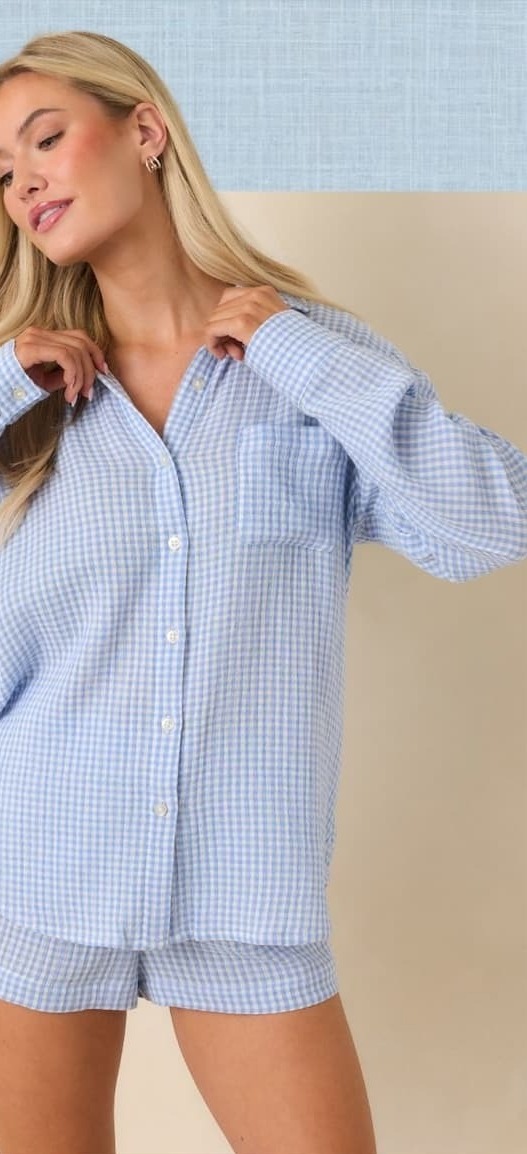 Woman wearing a Blue Cotton Classic Gingham Top with matching shorts.