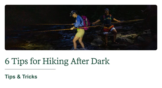 Two pals hiking after nightfall. Headline: 6 Tips for Hiking After Dark. Tips & Tricks