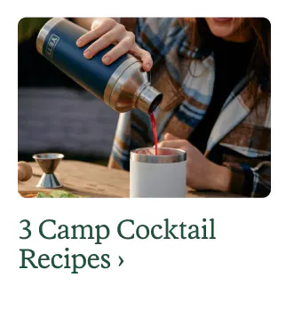 A person pours a camp cocktail into a glass. Headline: 3 Camp Cocktail Recipes.