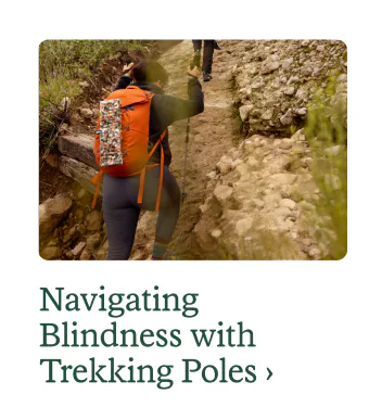 A hiker using trekking poles. Headline: Navigating Blindness with Trekking Poles