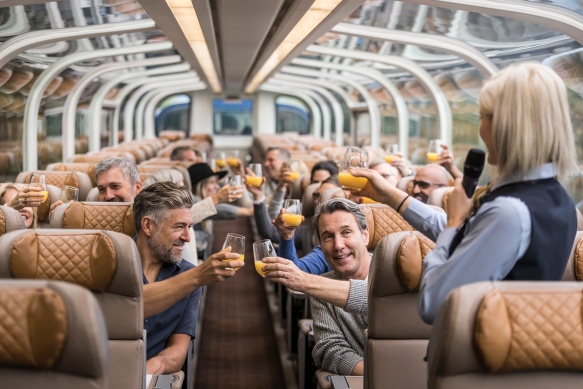 Onboard host gives welcome toast as guests cheers.